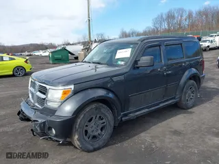 2011 Dodge Nitro SE with VIN 1D4PU2GK0BW541350, listed as a IAAI auction lot 41653467 with 207,940 mi miles. Bid and sale history available at carsss.com. Image 2.
