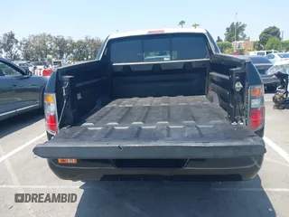 2006 Honda Ridgeline RTL with VIN 2HJYK16576H566002, listed as a IAAI auction lot 42595698 with 212,637 mi miles and . Bid and sale history available at DreamBid. Image 12.