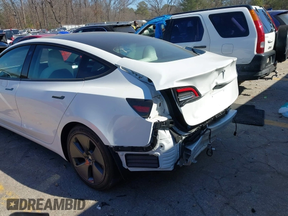 2022 Tesla Model 3 with VIN 5YJ3E1EA7NF103513, listed as a IAAI auction lot 41643592 with 35,631 mi miles and . Bid and sale history available at DreamBid. Image 22.