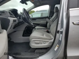 2021 Honda Odyssey EX-L with VIN 5FNRL6H79MB044718, listed as a Copart auction lot 65351134 with 28,888 mi miles and Salvage Title. Bid and sale history available at DreamBid. Image 7.