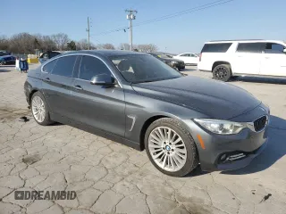2015 BMW 4 Series 428i with VIN WBA4A9C52FD416219, listed as a Copart auction lot 48703365 with 87,162 mi miles and Clean title. Bid and sale history available at DreamBid. Image 4.