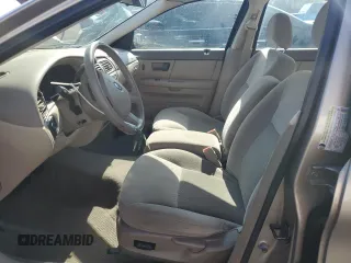 2005 Ford Taurus SE z VIN 1FAFP53215A212736, wystawiony jako Copart lot #58439495 z przebiegiem Nie podano mil oraz Szkoda całkowita • Salvage title. Historia ofert i sprzedaży dostępna na DreamBid. Obrazek 7.