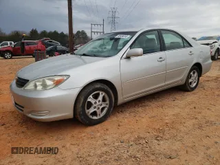 2002 Toyota Camry LE z VIN 4T1BE32K72U058320, wystawiony jako Copart lot #48456245 z przebiegiem 267 504 mil mil oraz Szkoda całkowita • Salvage title. Historia ofert i sprzedaży dostępna na DreamBid. Obrazek 1.