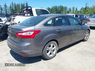 2013 Ford Focus SE z VIN 1FADP3F26DL266821, wystawiony jako IAAI lot #42677519 z przebiegiem 155 238 mil mil oraz . Historia ofert i sprzedaży dostępna na DreamBid. Obrazek 4.