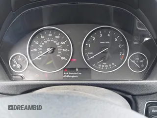 2014 BMW 3 Series 328i xDrive with VIN WBA3B3C58EJ982424, listed as a IAAI auction lot 42075568 with 190,009 mi miles. Bid and sale history available at carsss.com. Image 7.