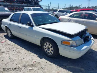 2008 Ford Crown Victoria LX with VIN 2FAFP74V68X132011, listed as a IAAI auction lot 41738460 with NaN miles. Bid and sale history available at carsss.com. Image 1.