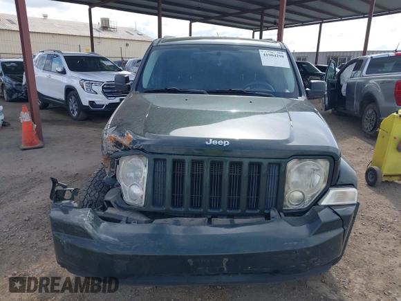 2011 Jeep Liberty Sport 70th Anniversary with VIN 1J4PN2GK8BW568560, listed as a IAAI auction lot 41904298 with 122,727 mi miles and . Bid and sale history available at DreamBid. Image 13.