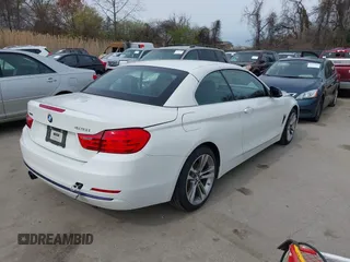 2014 BMW 4 Series 428i xDrive with VIN WBA3V9C56EPR69436, listed as a IAAI auction lot 41951778 with 169,085 mi miles and . Bid and sale history available at carsss.com. Image 4.
