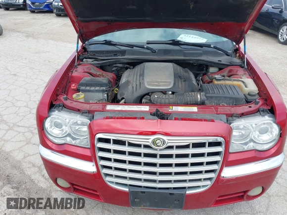 2007 Chrysler 300 C with VIN 2C3KA63H57H684368, listed as a IAAI auction lot 42144972 with 117,478 mi miles. Bid and sale history available at carsss.com. Image 10.