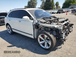 2021 Bentley Bentayga V8 z VIN SJAAM2ZVXMC032804, wystawiony jako Copart lot #70631504 z przebiegiem 37 960 mil mil oraz Szkoda całkowita • Salvage title. Historia ofert i sprzedaży dostępna na DreamBid. Obrazek 4.