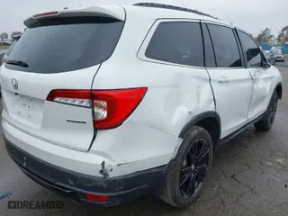 2021 Honda Pilot Special Edition with VIN 5FNYF5H28MB040600, listed as a IAAI auction lot 41512530 with 23,528 mi miles. Bid and sale history available at carsss.com. Image 4.