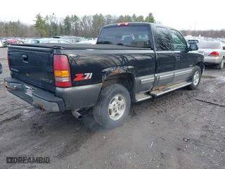 2000 Chevrolet Silverado 1500 LS with VIN 2GCEK19T5Y1292800, listed as a IAAI auction lot 42005453 with 100,332 mi miles. Bid and sale history available at carsss.com. Image 4.