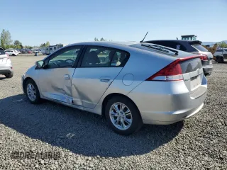 2010 Honda Insight EX z VIN JHMZE2H74AS034758, wystawiony jako Copart lot #52905445 z przebiegiem 154 148 mil mil oraz Szkoda całkowita • Salvage title. Historia ofert i sprzedaży dostępna na DreamBid. Obrazek 2.