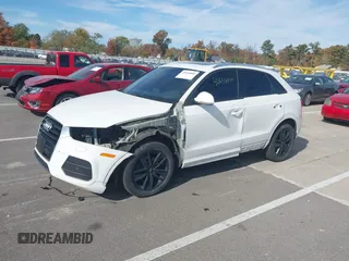 2017 Audi Q3 Premium z VIN WA1ECCFS0HR008186, wystawiony jako IAAI lot #40648800 z przebiegiem 139 379 mil mil oraz . Historia ofert i sprzedaży dostępna na DreamBid. Obrazek 18.