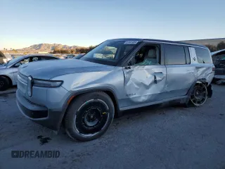 2025 Rivian R1S Adventure with VIN 7PDSGBBA0SN051096, listed as a Copart auction lot 87441054 with 30 mi miles and Salvage Title. Bid and sale history available at carsss.com. Image 1.