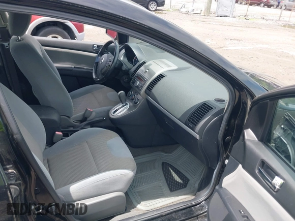 2010 Nissan Sentra S with VIN 3N1AB6APXAL621668, listed as a IAAI auction lot 42656830 with 154,484 mi miles and . Bid and sale history available at DreamBid. Image 5.