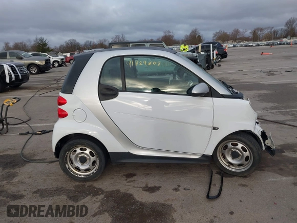 2013 Smart fortwo Pure with VIN WMEEJ3BA2DK702004, listed as a IAAI auction lot 41829808 with 53,545 mi miles and . Bid and sale history available at DreamBid. Image 14.