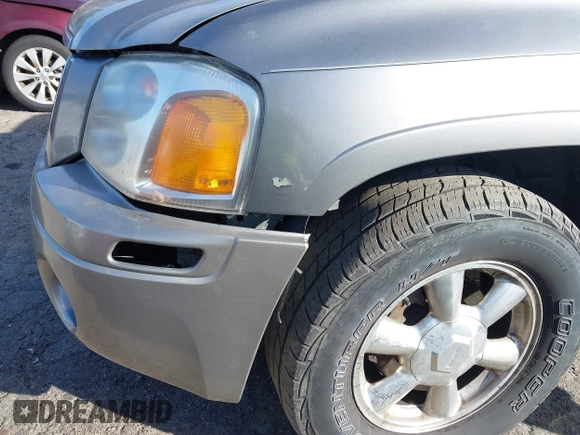 2003 GMC Envoy SLE with VIN 1GKDT13S132377154, listed as a IAAI auction lot 41484891 with 226,008 mi miles. Bid and sale history available at carsss.com. Image 6.