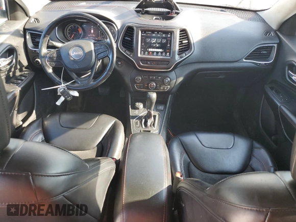 2020 Jeep Cherokee Trailhawk with VIN 1C4PJMBX8LD630827, listed as a Copart auction lot 61975455 with 142,716 mi miles and Clean title. Bid and sale history available at DreamBid. Image 8.