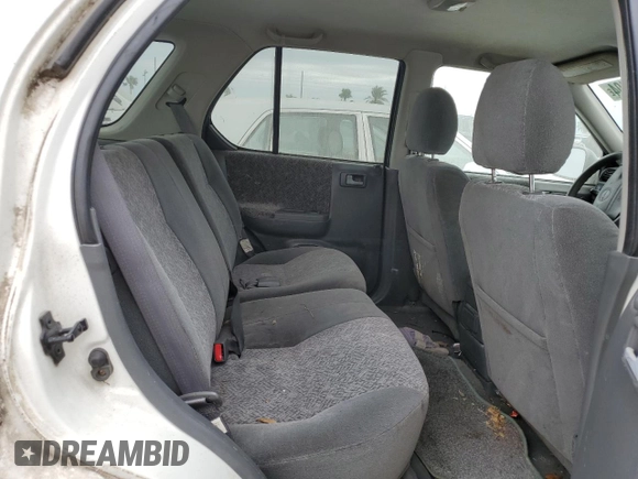 2002 Isuzu Rodeo S with VIN 4S2DM58W324327147, listed as a Copart auction lot 75194104 with Not Provided miles and Salvage Title. Bid and sale history available at DreamBid. Image 11.