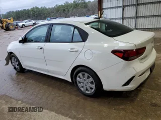 2023 Kia Rio LX with VIN 3KPA24ADXPE615843, listed as a Copart auction lot 47660125 with 27,841 mi miles and Salvage Title. Bid and sale history available at DreamBid. Image 2.