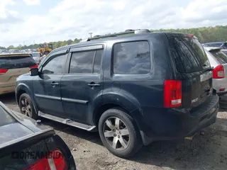 2012 Honda Pilot Touring with VIN 5FNYF4H92CB051260, listed as a IAAI auction lot 41906802 with 256,691 mi miles. Bid and sale history available at carsss.com. Image 14.