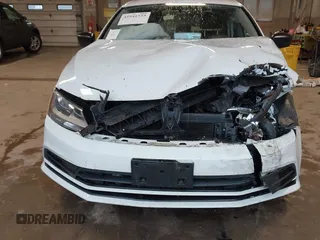 2015 Volkswagen Jetta Sedan 2.0L S with VIN 3VW2K7AJ1FM225534, listed as a IAAI auction lot 41941755 with 123,890 mi miles. Bid and sale history available at carsss.com. Image 6.