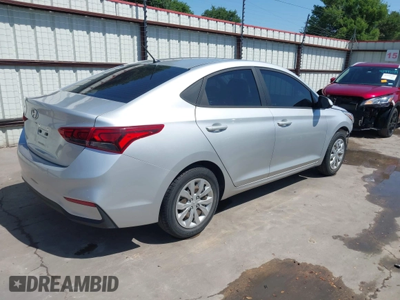 2020 Hyundai Accent SE with VIN 3KPC24A66LE119586, listed as a IAAI auction lot 41986764 with 64,248 mi miles and . Bid and sale history available at DreamBid. Image 4.