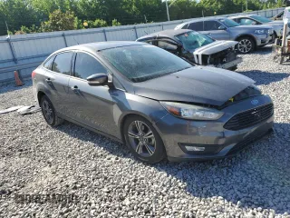 2016 Ford Focus SE with VIN 1FADP3FE8GL381855, listed as a Copart auction lot 57366645 with 104,709 mi miles and Salvage title. Bid and sale history available at DreamBid. Image 4.