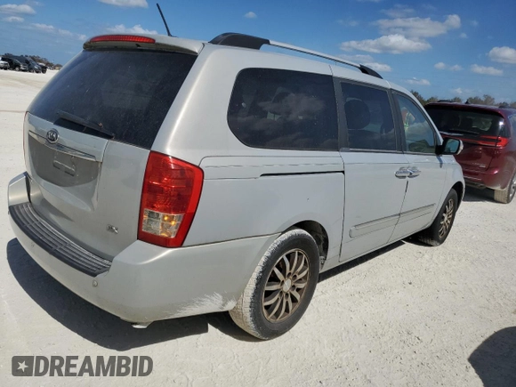 2012 Kia Sedona EX with VIN KNDMH4C72C6459882, listed as a Copart auction lot 77481744 with 136,947 mi miles and Salvage Title. Bid and sale history available at carsss.com. Image 3.