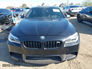 2014 BMW M5 with VIN WBSFV9C56ED097611, listed as a IAAI auction lot 41845196 with 72,215 mi miles. Bid and sale history available at carsss.com. Image 12.