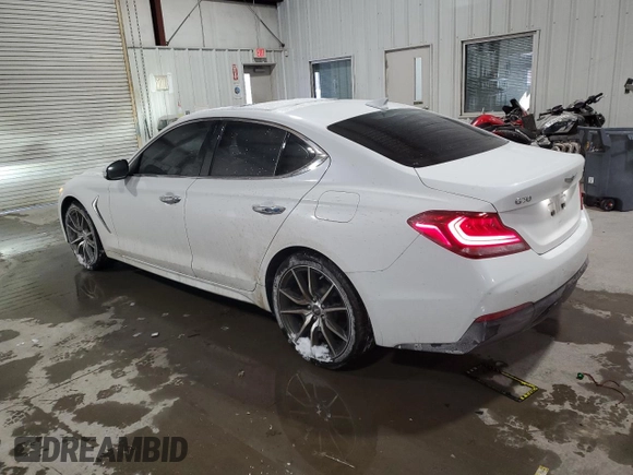 2021 Genesis G70 2.0T with VIN KMTG44LAXMU070314, listed as a Copart auction lot 88990385 with 52,517 mi miles and Salvage title. Bid and sale history available at DreamBid. Image 2.