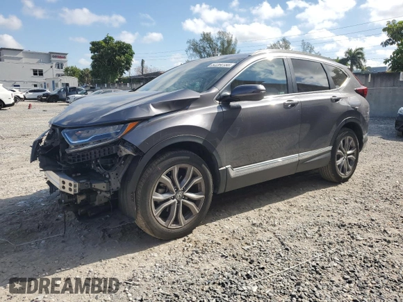 2020 Honda CR-V Touring with VIN 2HKRW2H96LH677520, listed as a Copart auction lot 52264155 with 33,909 mi miles and Salvage Title. Bid and sale history available at DreamBid. Image 1.