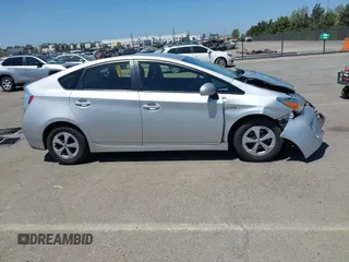 2015 Toyota Prius Four with VIN JTDKN3DU0F0443458, listed as a IAAI auction lot 42086506 with 121,952 mi miles and . Bid and sale history available at DreamBid. Image 14.
