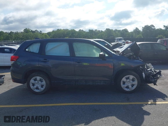 2022 Subaru Forester with VIN JF2SKAAC3NH503999, listed as a IAAI auction lot 42373622 with 18,430 mi miles and . Bid and sale history available at DreamBid. Image 14.