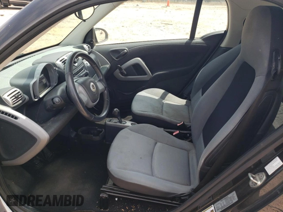 2009 Smart fortwo Pure with VIN WMEEJ31X19K216555, listed as a Copart auction lot 64412765 with 74,152 mi miles and Clean title. Bid and sale history available at DreamBid. Image 7.