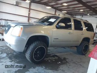 2012 GMC Yukon SLT with VIN 1GKS2CE03CR134986, listed as a IAAI auction lot 41352570 with 141,098 mi miles. Bid and sale history available at carsss.com. Image 14.