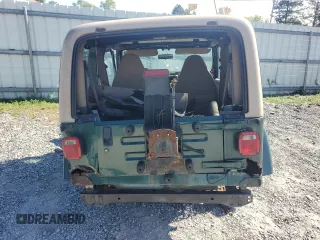 2000 Jeep Wrangler Sahara with VIN 1J4FA59S0YP720856, listed as a Copart auction lot 73128204 with 0 mi miles and Clean Title. Bid and sale history available at carsss.com. Image 6.