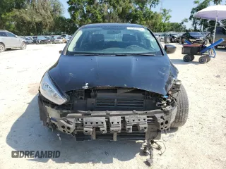 2018 Ford Focus SE z VIN 1FADP3FEXJL256542, wystawiony jako Copart lot #54583915 z przebiegiem 107 774 mil mil oraz Szkoda całkowita • Salvage title. Historia ofert i sprzedaży dostępna na DreamBid. Obrazek 5.