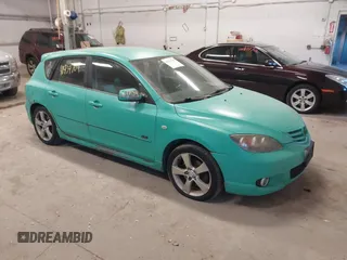 2005 Mazda 3 s with VIN JM1BK143751300889, listed as a IAAI auction lot 40939709 with 199,763 mi miles. Bid and sale history available at carsss.com. Image 1.