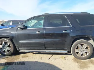 2016 GMC Acadia Denali with VIN 1GKKRTKDXGJ159049, listed as a IAAI auction lot 41334814 with 150,351 mi miles. Bid and sale history available at carsss.com. Image 14.