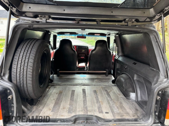 1997 Jeep Cherokee with VIN 1J4FT67S6VL571732, listed as a Copart auction lot 61440245 with 153,147 mi miles and Clean title. Bid and sale history available at DreamBid. Image 6.