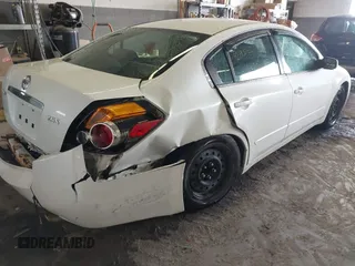 2009 Nissan Altima S z VIN 1N4AL21E59N477966, wystawiony jako IAAI lot #42190062 z przebiegiem 171 127 mil mil oraz . Historia ofert i sprzedaży dostępna na DreamBid. Obrazek 4.