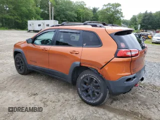 2016 Jeep Cherokee Trailhawk with VIN 1C4PJMBS2GW255368, listed as a Copart auction lot 59010305 with 105,667 mi miles and Salvage title. Bid and sale history available at DreamBid. Image 2.
