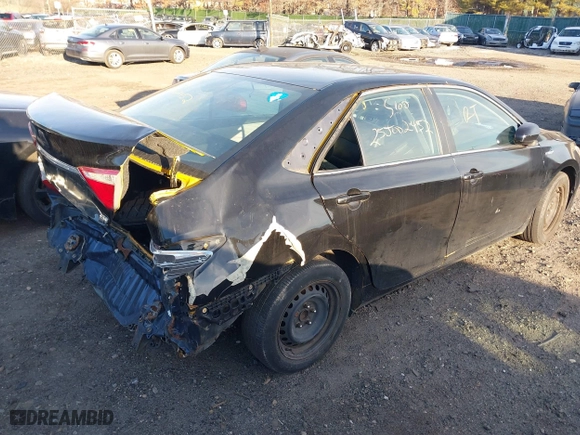 2015 Toyota Camry Hybrid LE with VIN 4T1BD1FK0FU163708, listed as a IAAI auction lot 41766167 with 999,999 mi miles. Bid and sale history available at carsss.com. Image 4.