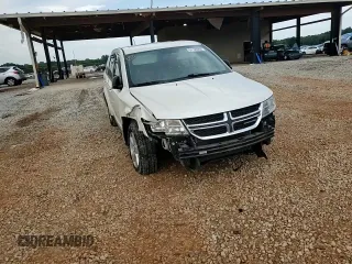 2013 Dodge Journey American Value with VIN 3C4PDCAB5DT656997, listed as a Copart auction lot 57123565 with 201,799 mi miles and Salvage title. Bid and sale history available at DreamBid. Image 15.