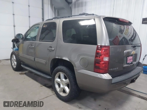 2011 Chevrolet Tahoe LT with VIN 1GNSKBE03BR268246, listed as a IAAI auction lot 41434862 with 250,991 mi miles and . Bid and sale history available at DreamBid. Image 3.