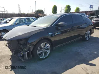 2018 Honda Clarity Touring z VIN JHMZC5F31JC014923, wystawiony jako Copart lot #58270935 z przebiegiem 108 406 mil mil oraz Szkoda całkowita • Salvage title. Historia ofert i sprzedaży dostępna na DreamBid. Obrazek 1.