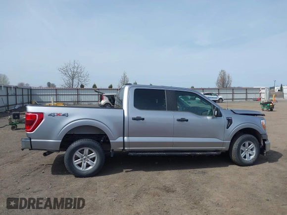 2021 Ford F-150 XL z VIN 1FTFW1E5XMFA28555, wystawiony jako IAAI lot #41814344 z przebiegiem 31 680 mil mil oraz . Historia ofert i sprzedaży dostępna na DreamBid. Obrazek 13.