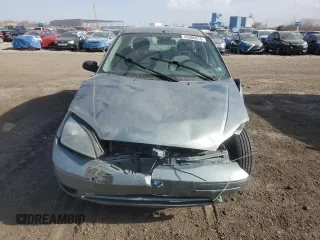 2005 Ford Focus S with VIN 1FAFP34NX5W175332, listed as a Copart auction lot 49306815 with 146,290 mi miles and Salvage Title. Bid and sale history available at carsss.com. Image 5.